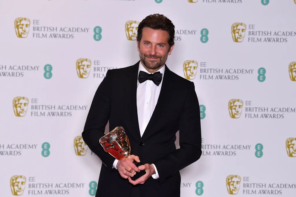 musician-actor-and-director-bradley-cooper-poses-with-the-news-photo-1097306582-1549988846